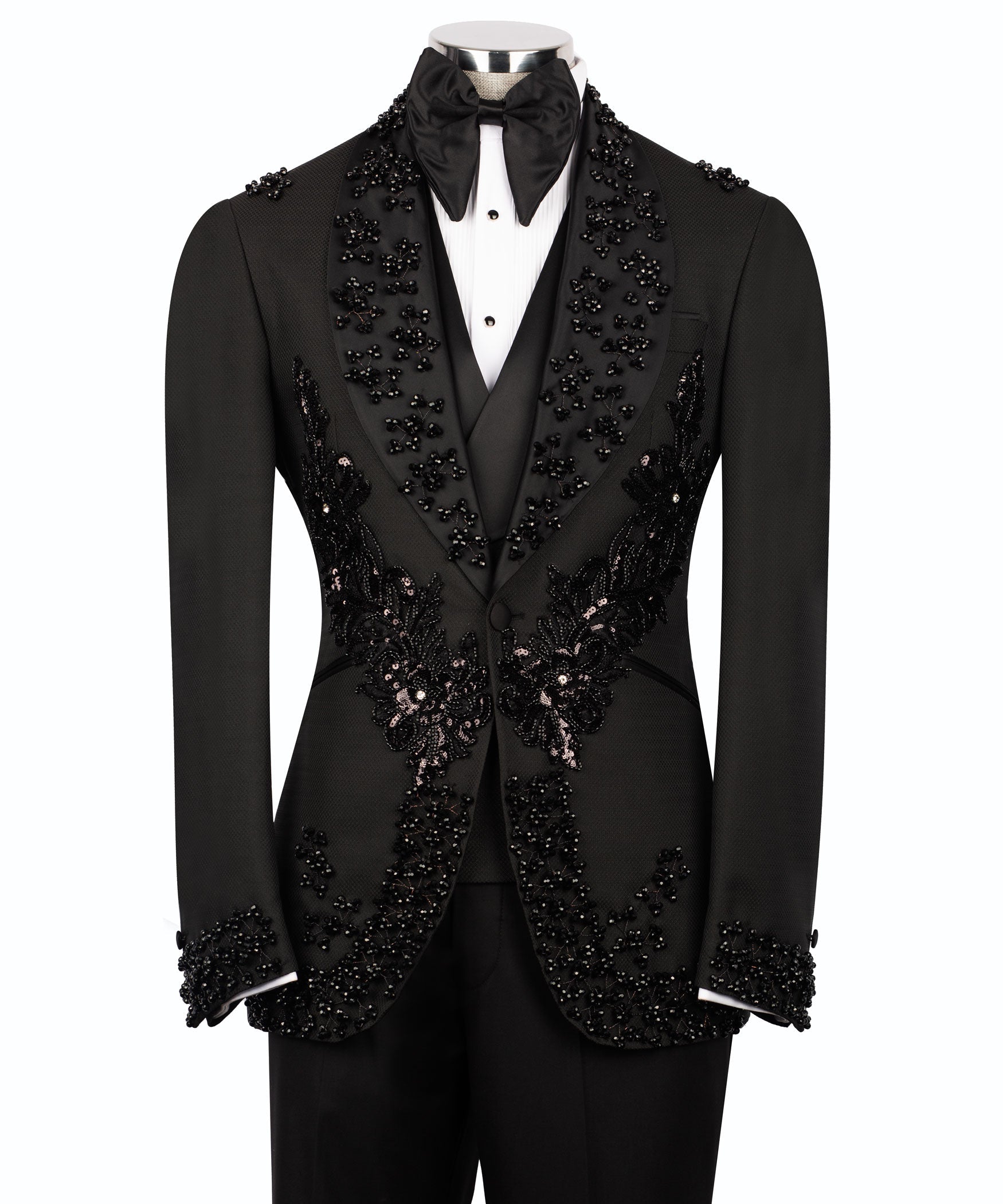 Black tuxedo suit with jeweled stone embroidery, satin bow tie, white shirt front
