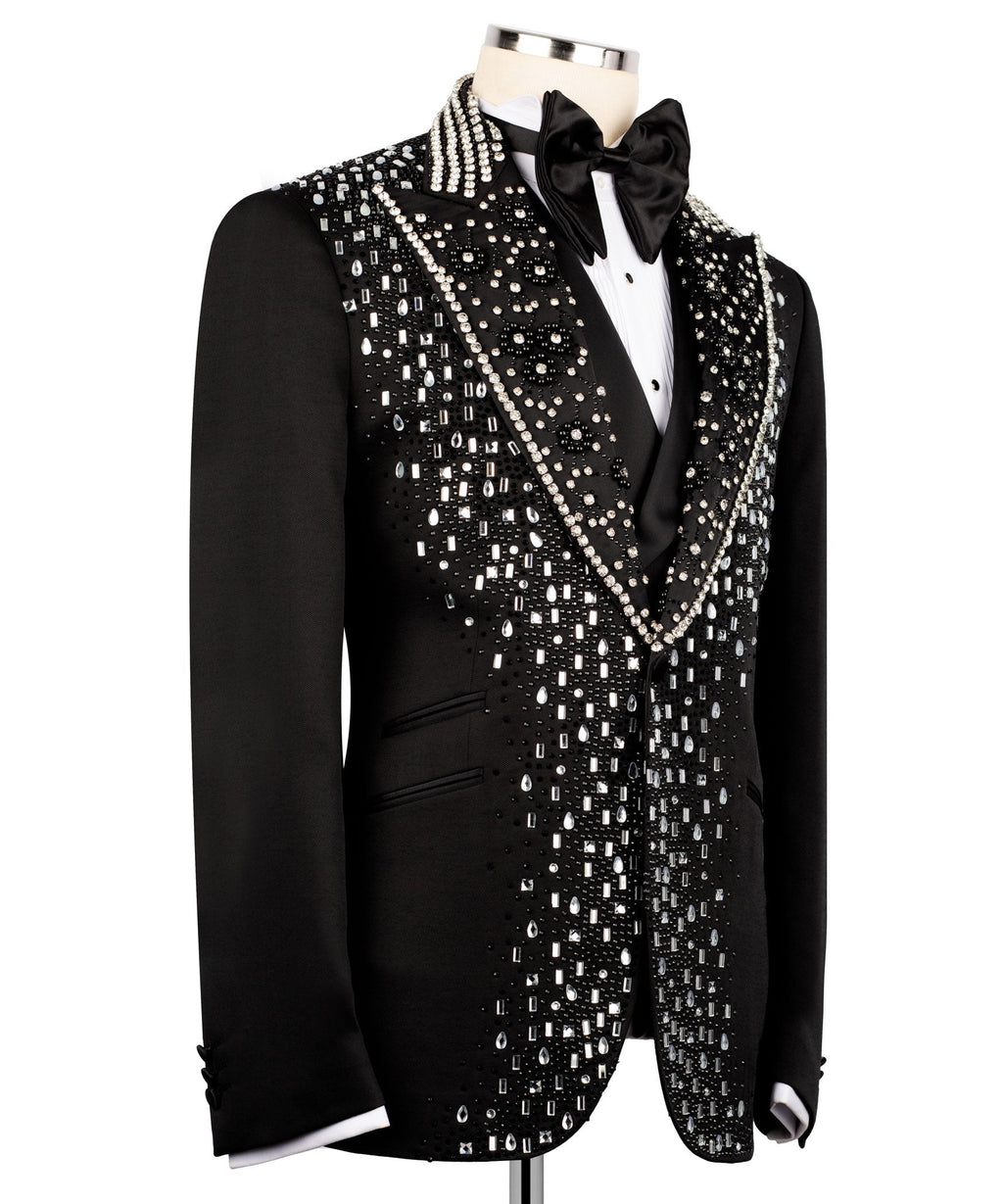 Men's black tuxedo jacket close-up of silver sequin embroidery along lapels