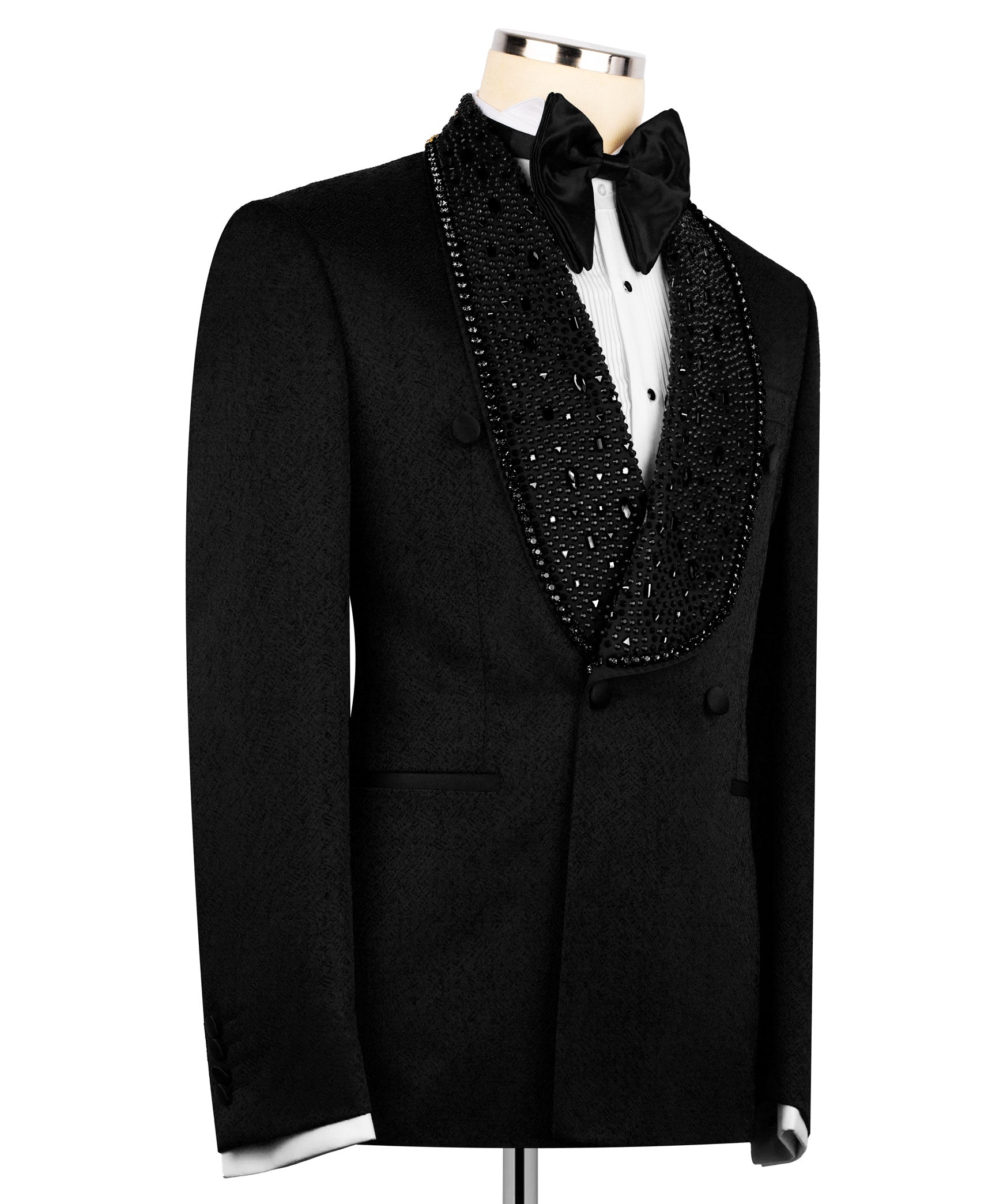 Black tuxedo coat with textured lapels, satin bow tie, double-breasted buttons