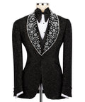 Black tuxedo jacket with sparkling crystal lapel detailing, satin bow tie, white shirt