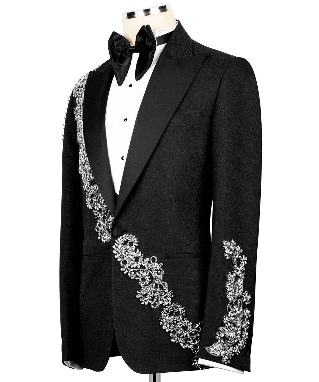 Black tuxedo jacket with silver stone-embroidered diagonal detailing and satin bow tie