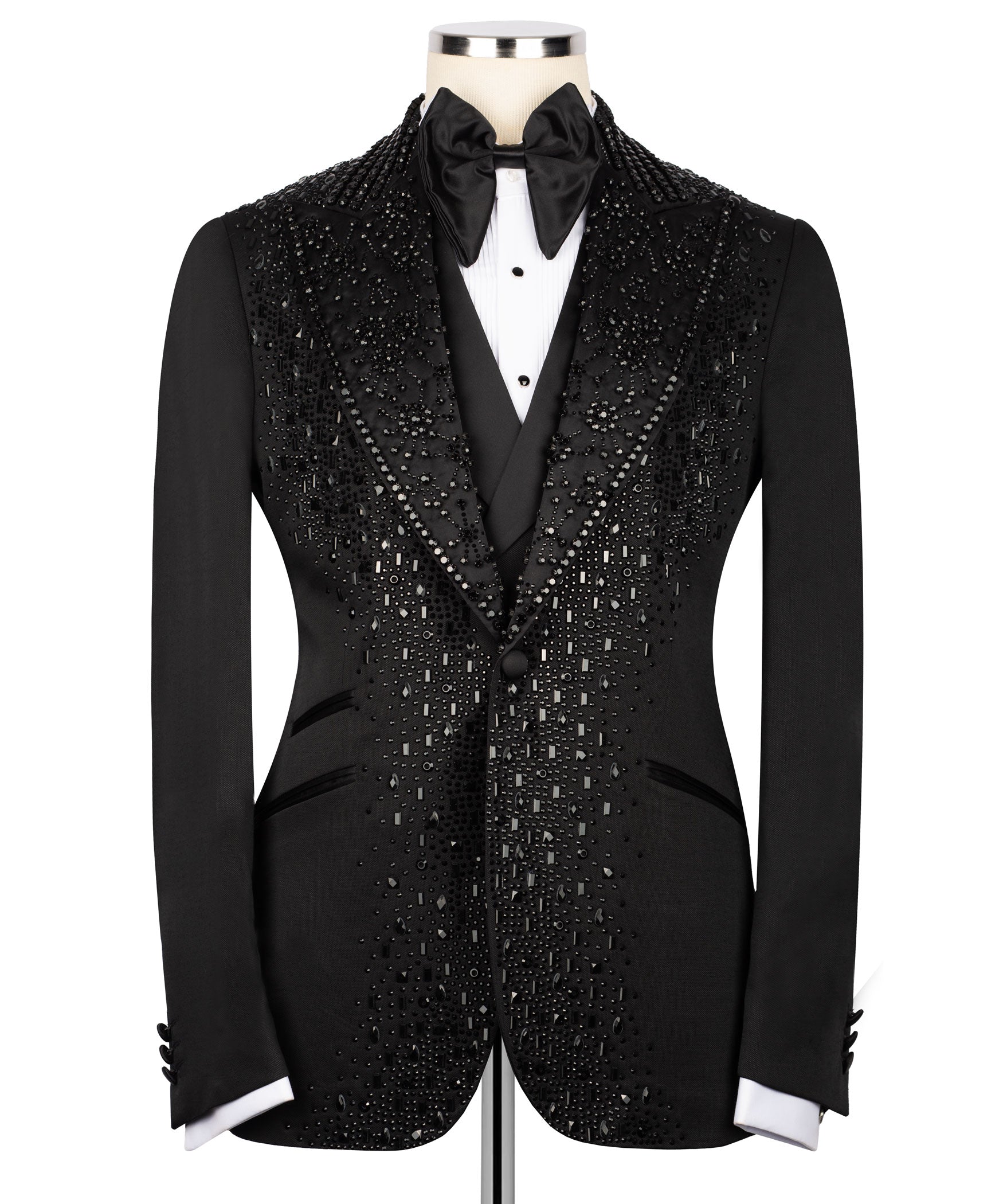 Black tuxedo jacket front with stone-studded panels, satin bow tie, white shirt
