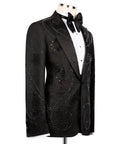 Black tuxedo jacket with embroidered front panels and satin bow tie at the collar