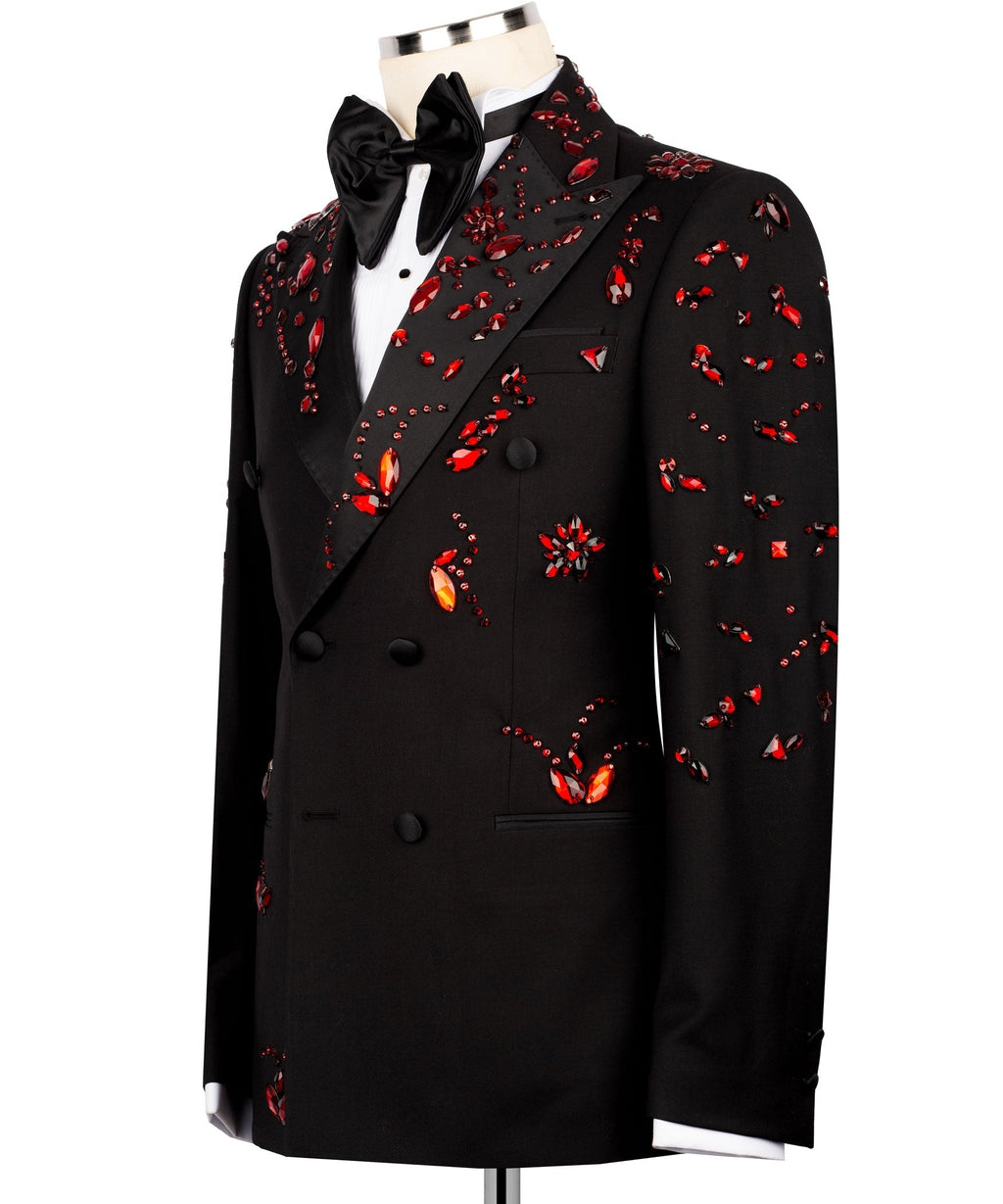 Black tuxedo jacket front view with red stone embroidery accents and satin bow tie