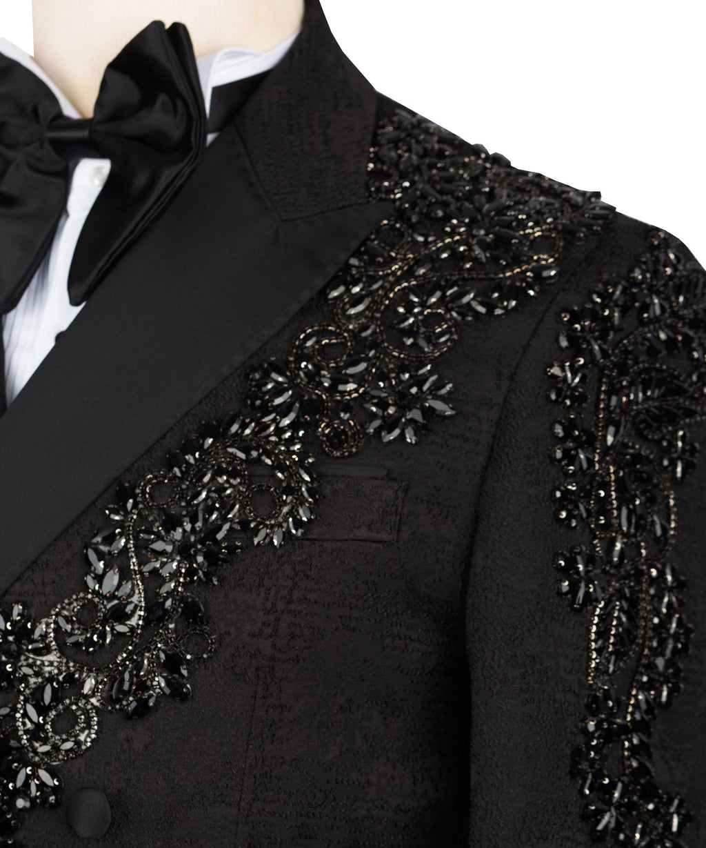 Close view of black tuxedo lapel with sparkling stone embroidery and buttons
