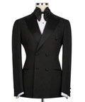 Black double-breasted tuxedo jacket with subtle patterned texture and satin lapels
