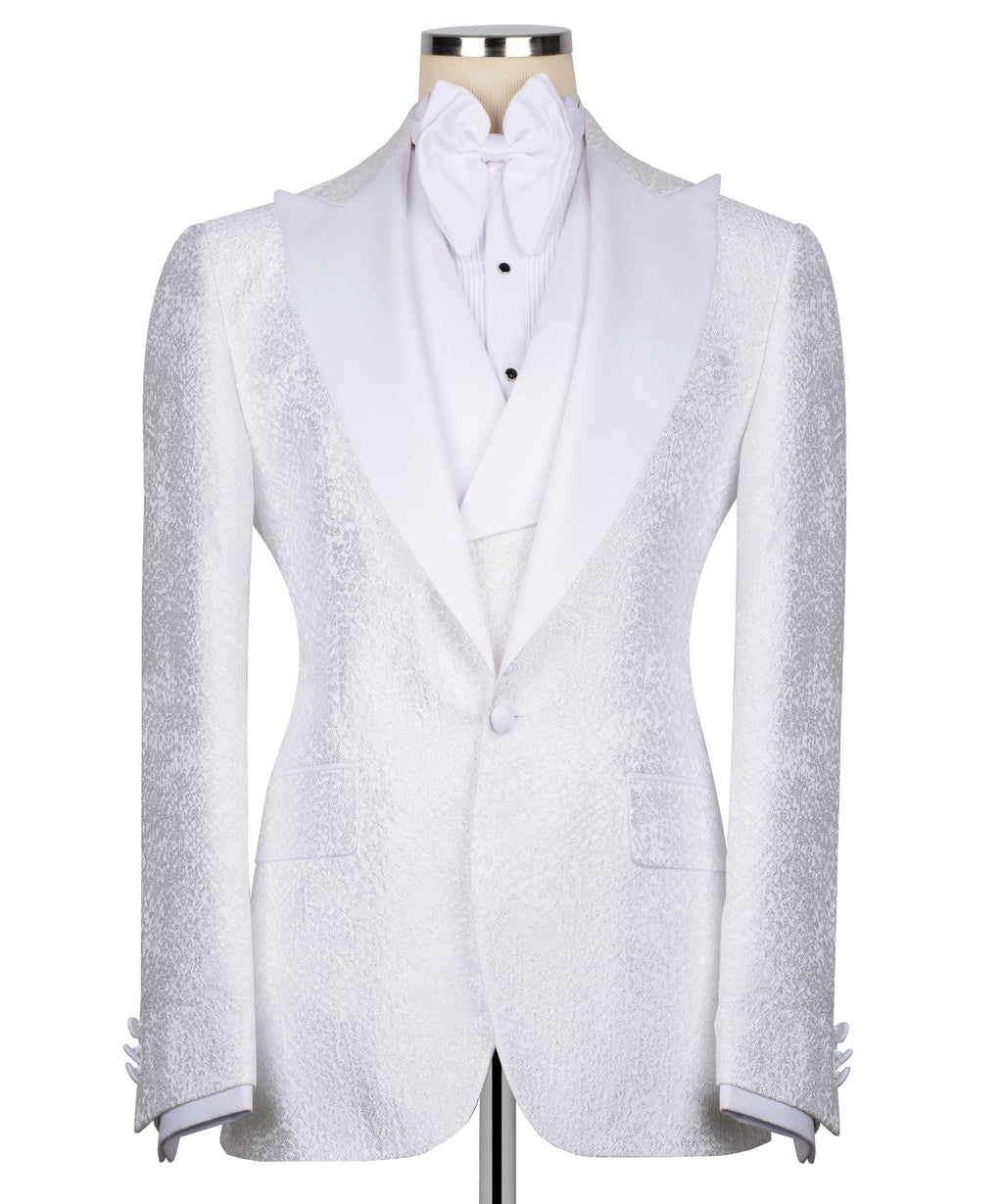 White single-button tuxedo jacket with stone-embroidered lapels and vest