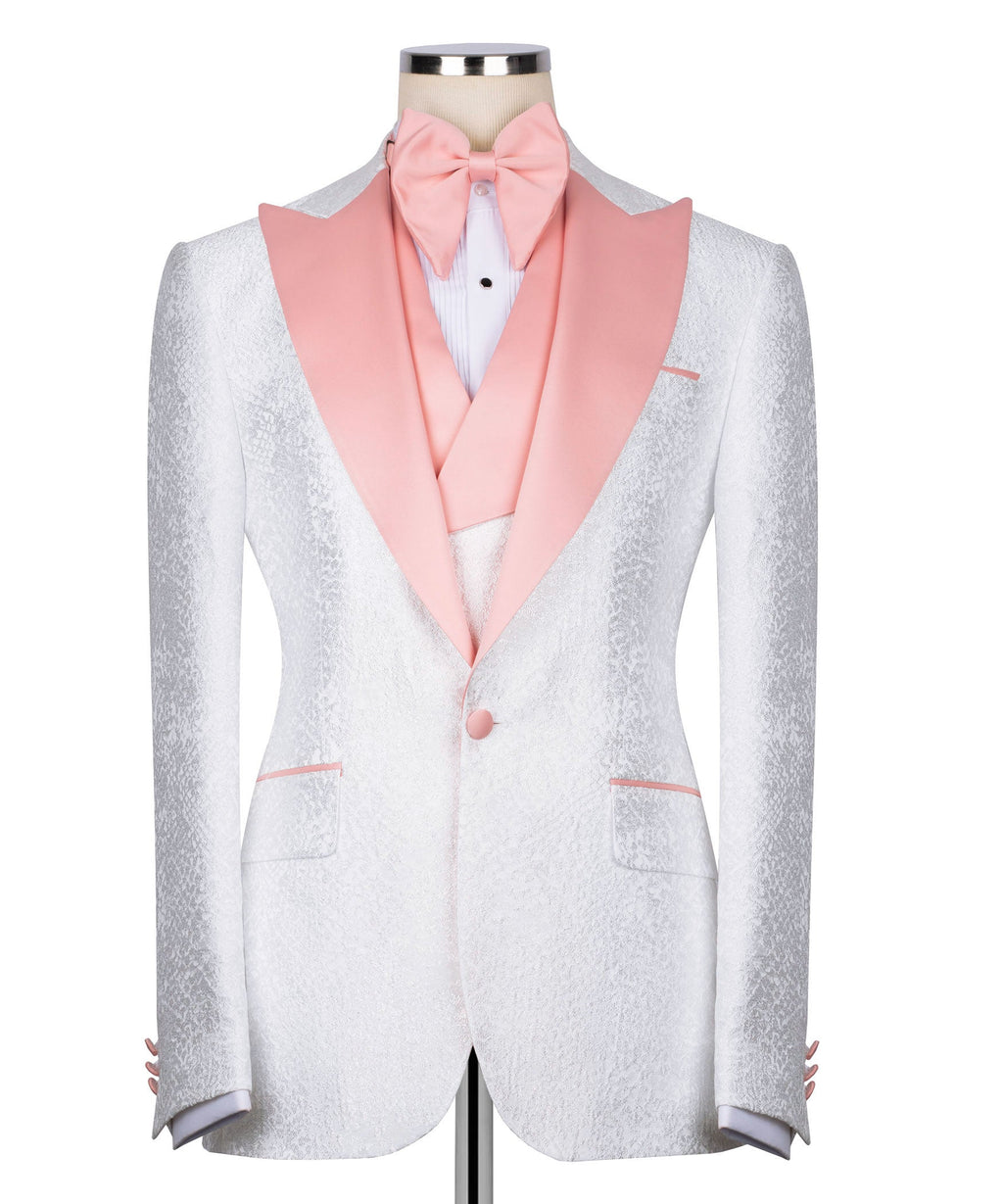 White tuxedo jacket front view with pale pink satin bow at collar and fitted waist