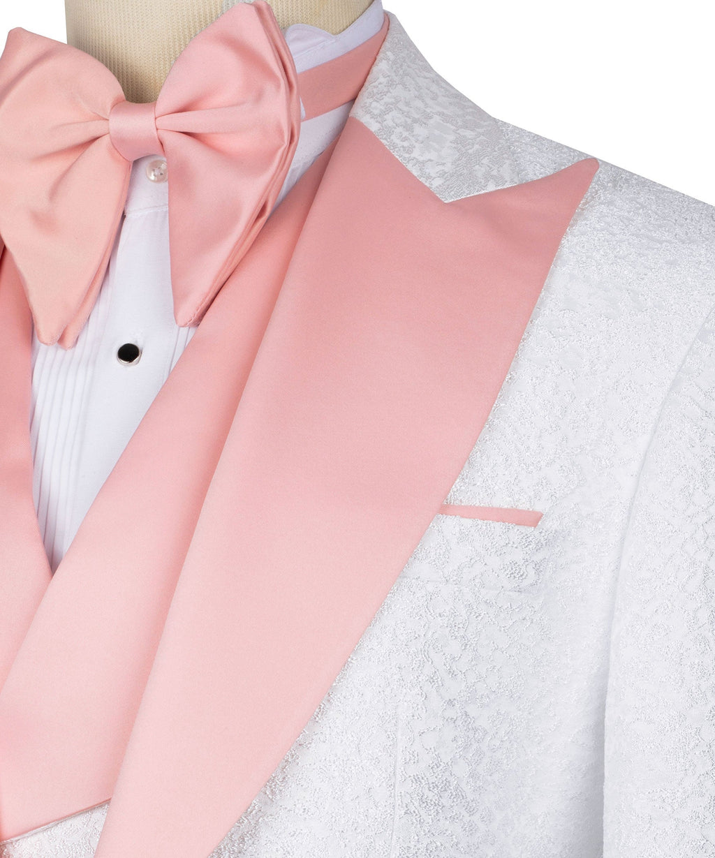 Pink satin bow and shawl collar on white tuxedo jacket; lapel close-up