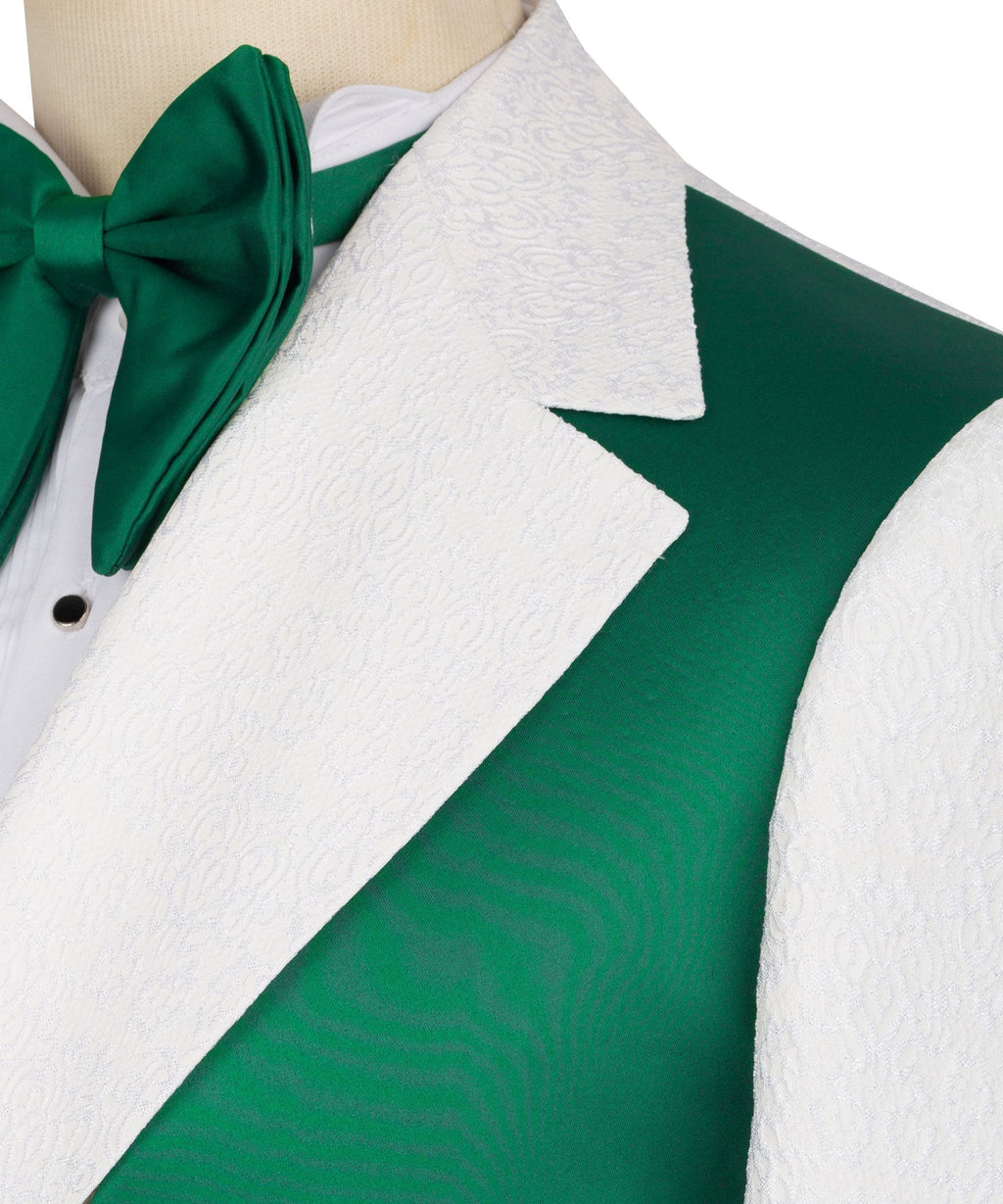 Close-up of green bow tie and textured white jacket lapel with green vest edge