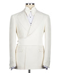 Cream tuxedo 3-piece set with textured jacket, bow tie, vest, and matching trousers