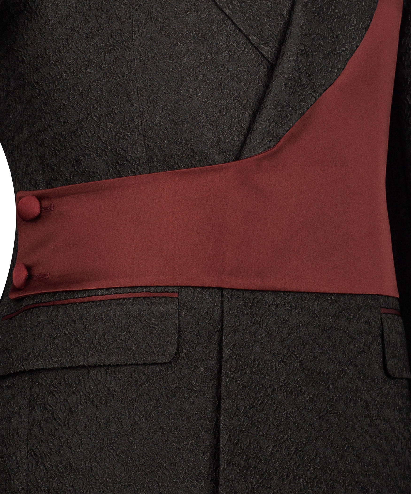 Maroon waistcoat with black trim over black textured tuxedo jacket