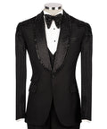 Black 3-piece tuxedo suit with long jeweled sleeves and patterned stone panels