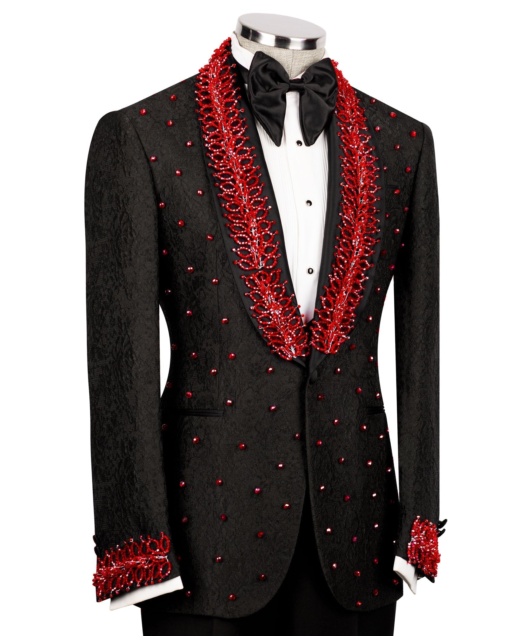 Black tuxedo suit with red jeweled trim on lapels and chest, bow tie and vest