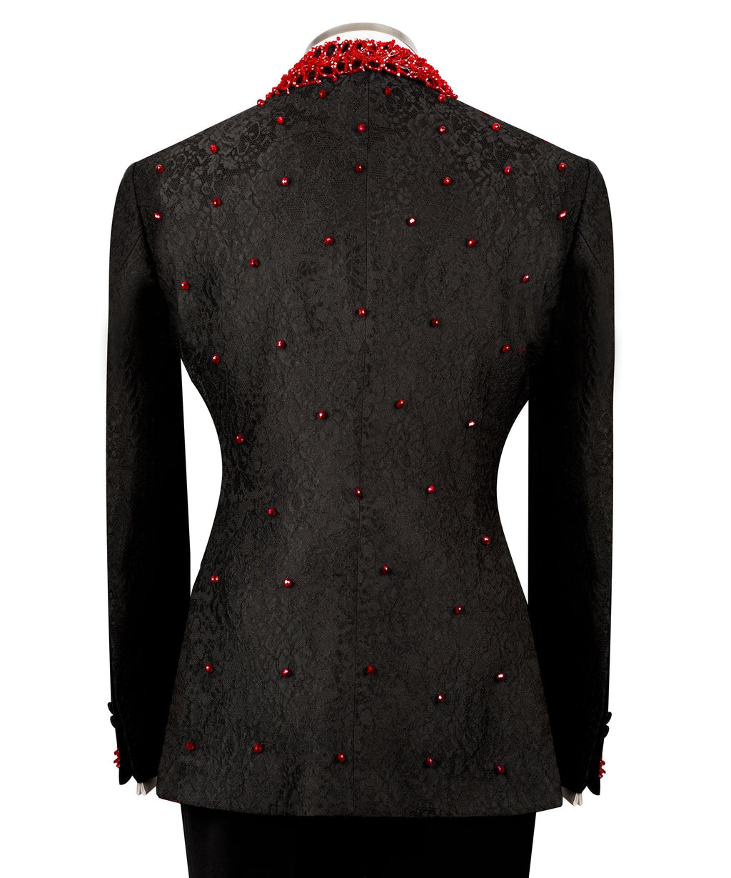 Black tuxedo jacket back with red stone dots, fitted waist, and long sleeves