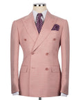 Light pink double-breasted suit jacket with notch lapels and flap pockets
