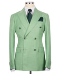 Light green double-breasted suit jacket with notched lapels and four-button front