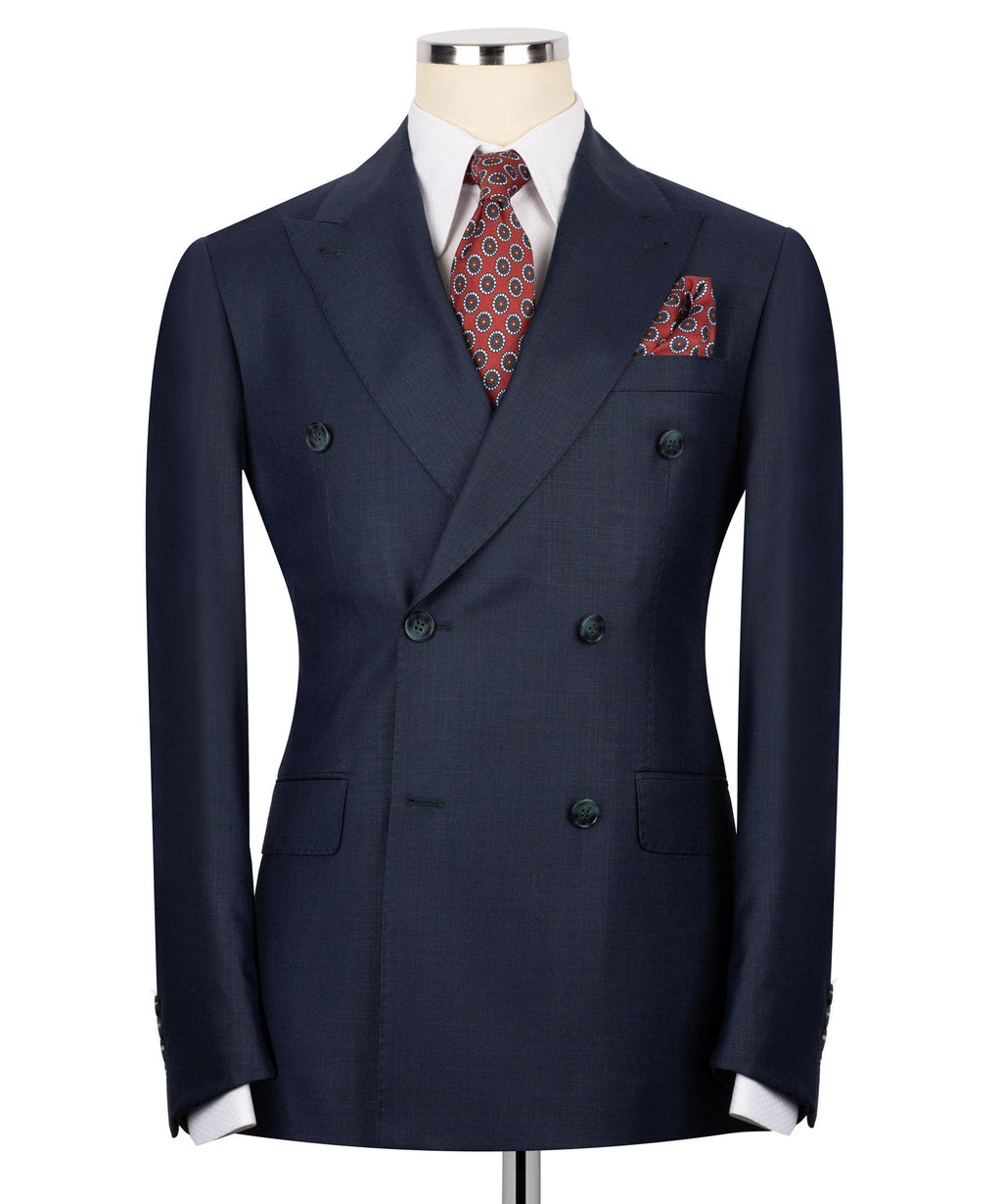 Navy double-breasted suit jacket with notch lapels, flap pockets, and green buttons