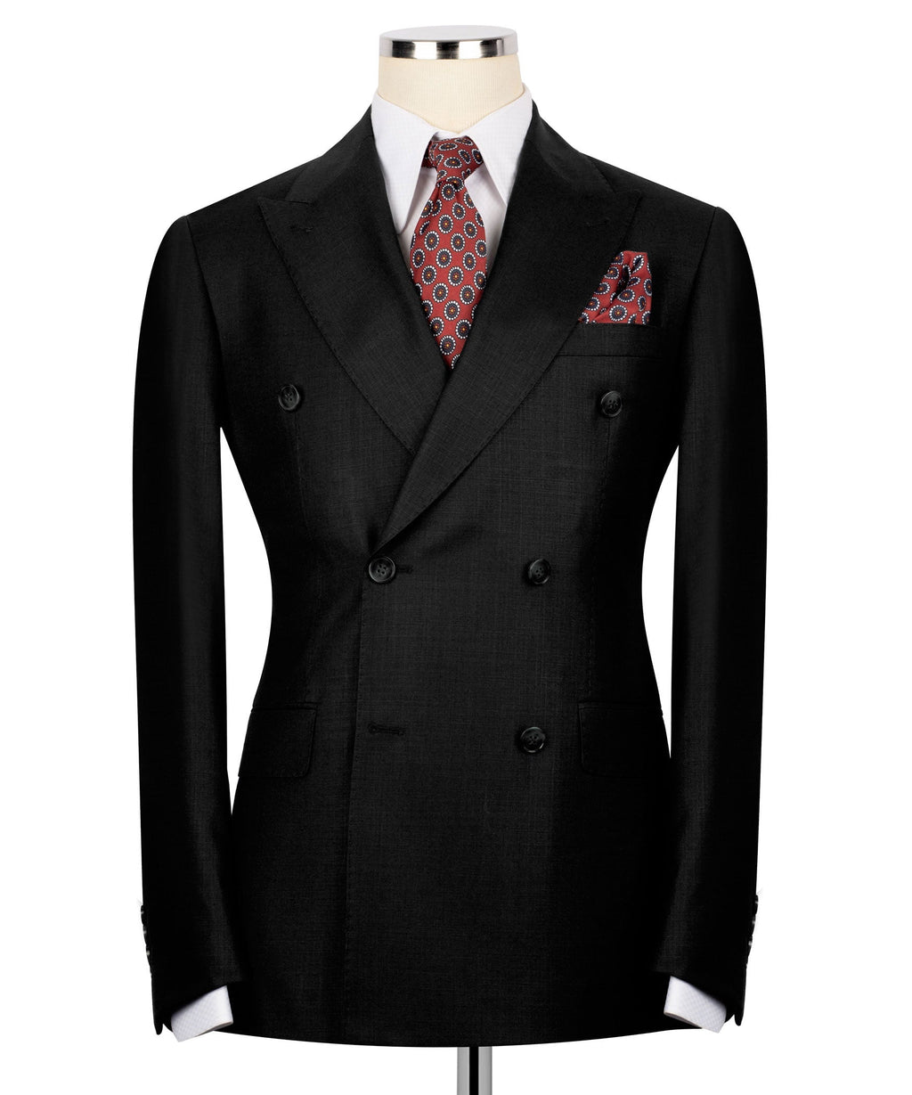 Black double-breasted blazer with patterned tie and red patterned pocket square