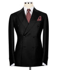 Black double-breasted blazer with patterned tie and red patterned pocket square