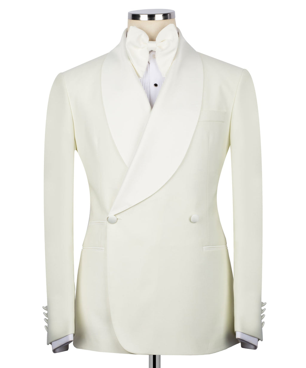 Cream tuxedo blazer with satin lapels, front buttons, and tailored double-breasted style