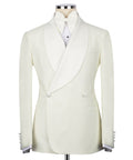 Cream tuxedo blazer with satin lapels, front buttons, and tailored double-breasted style