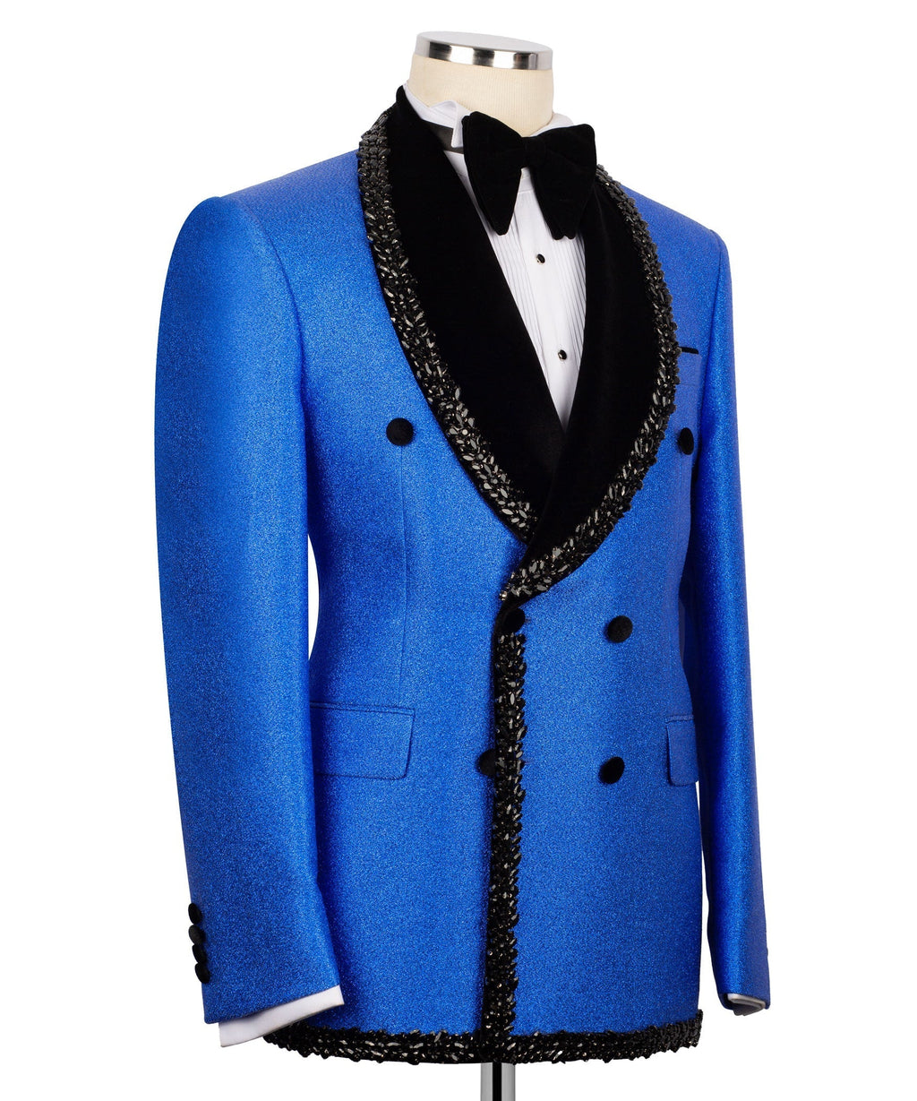 Blue tuxedo jacket with black velvet bow tie, double-breasted buttons, jeweled trim