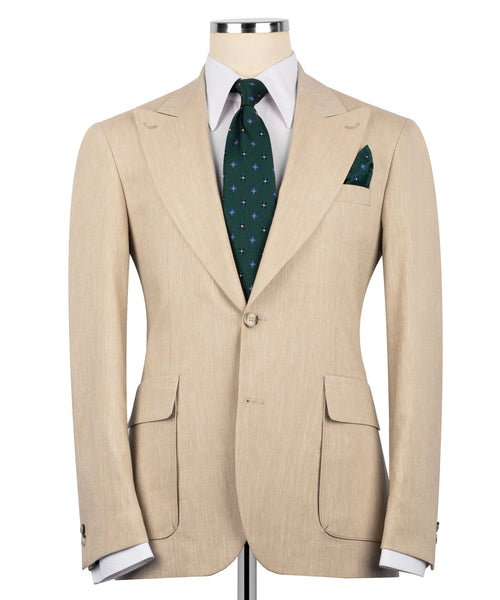 Beige linen suit jacket with flap pockets, plus green patterned tie and pocket square