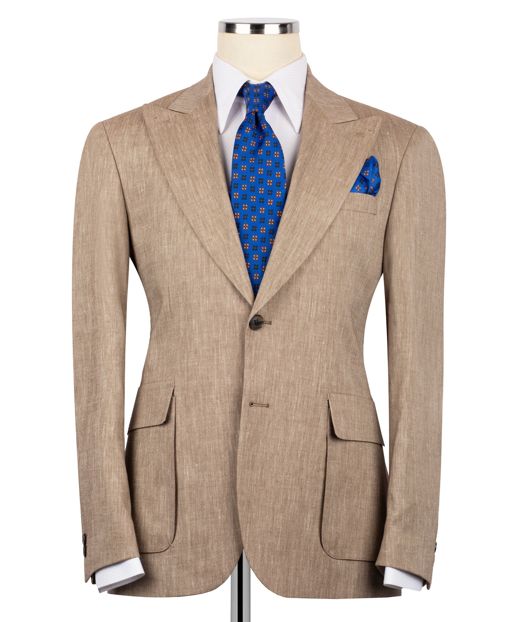 Tan linen blazer with notch lapels, two front pockets, blue patterned tie and pocket square