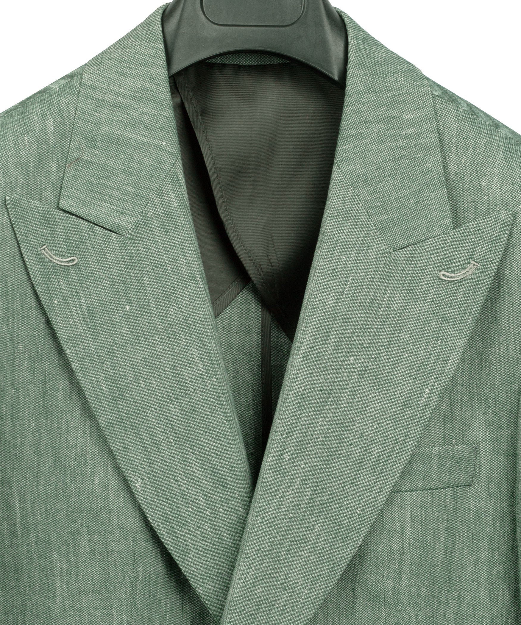 Green linen blazer open view with lapels, welt pockets, and inner lining