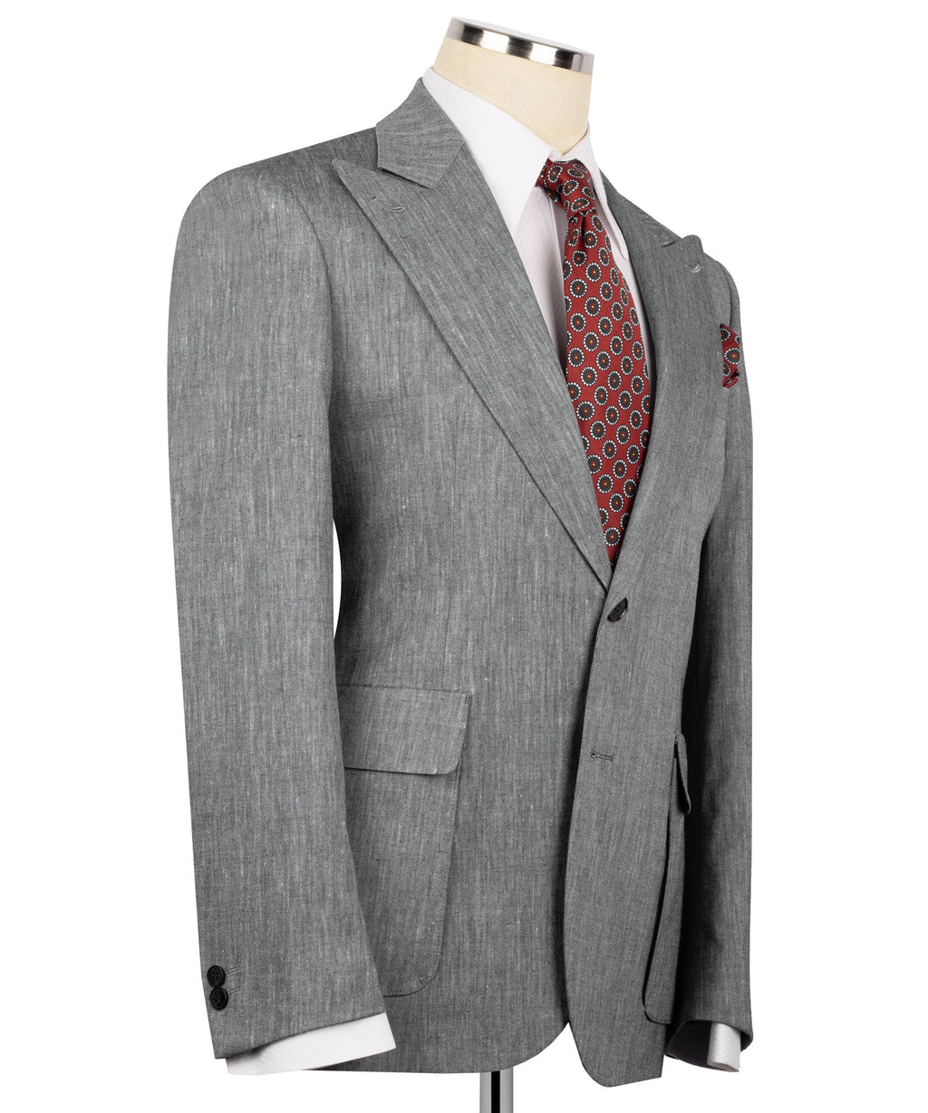 Gray linen men’s suit jacket with red patterned tie and matching pocket square