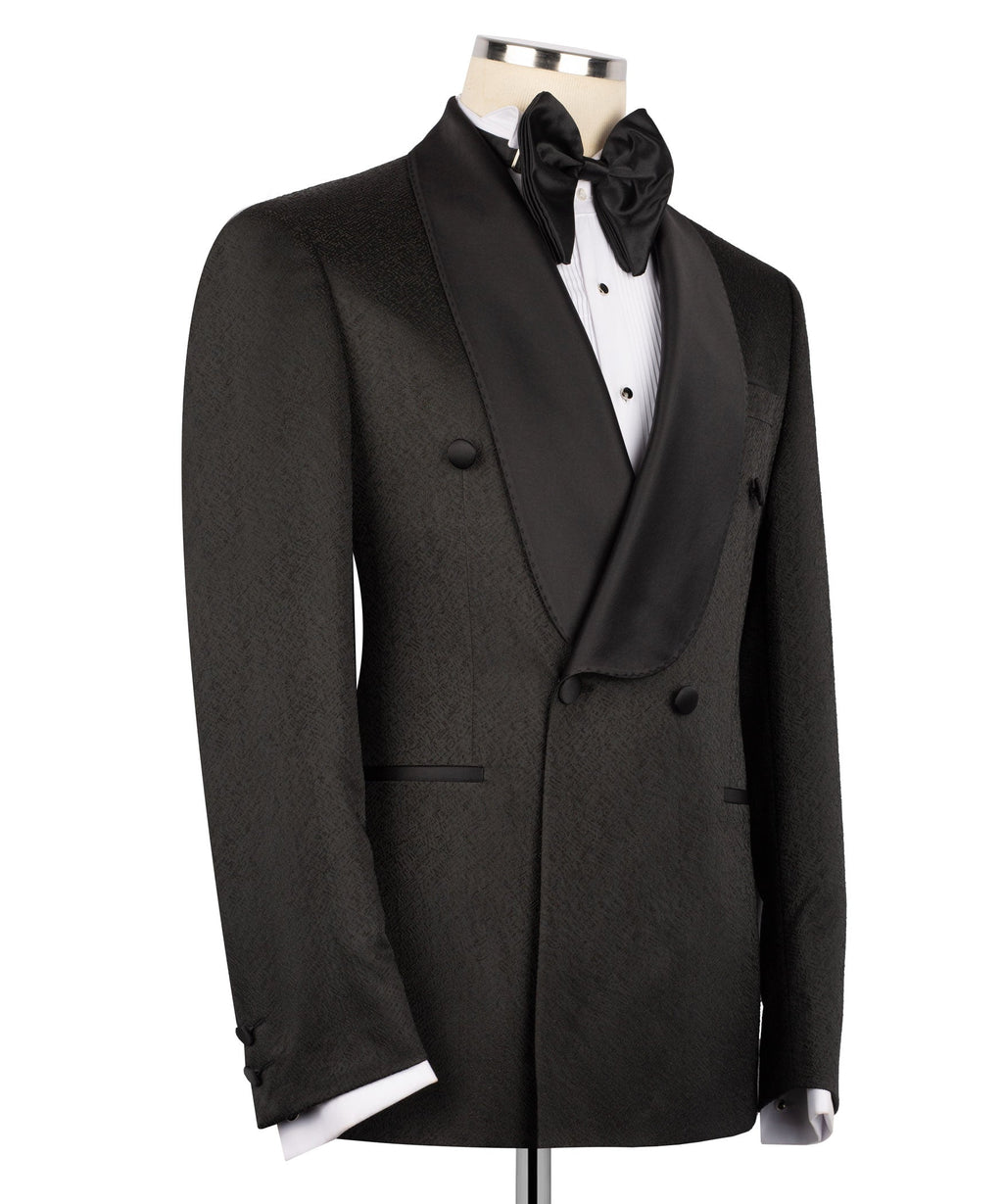 Black tuxedo jacket with bow tie and pocket flap details, double-breasted front