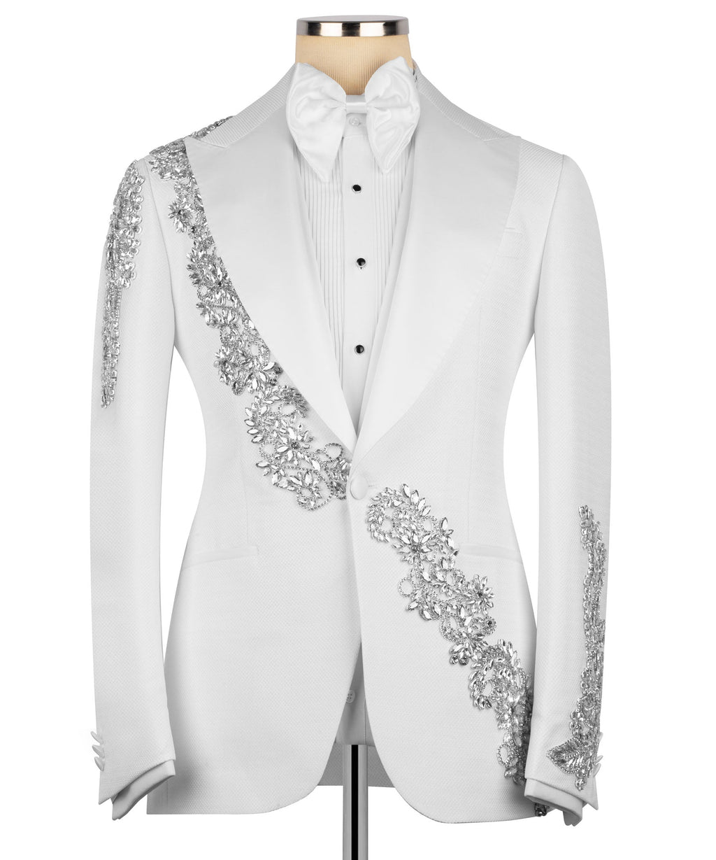 White tuxedo jacket with cascading silver stone embroidery down chest and sleeves