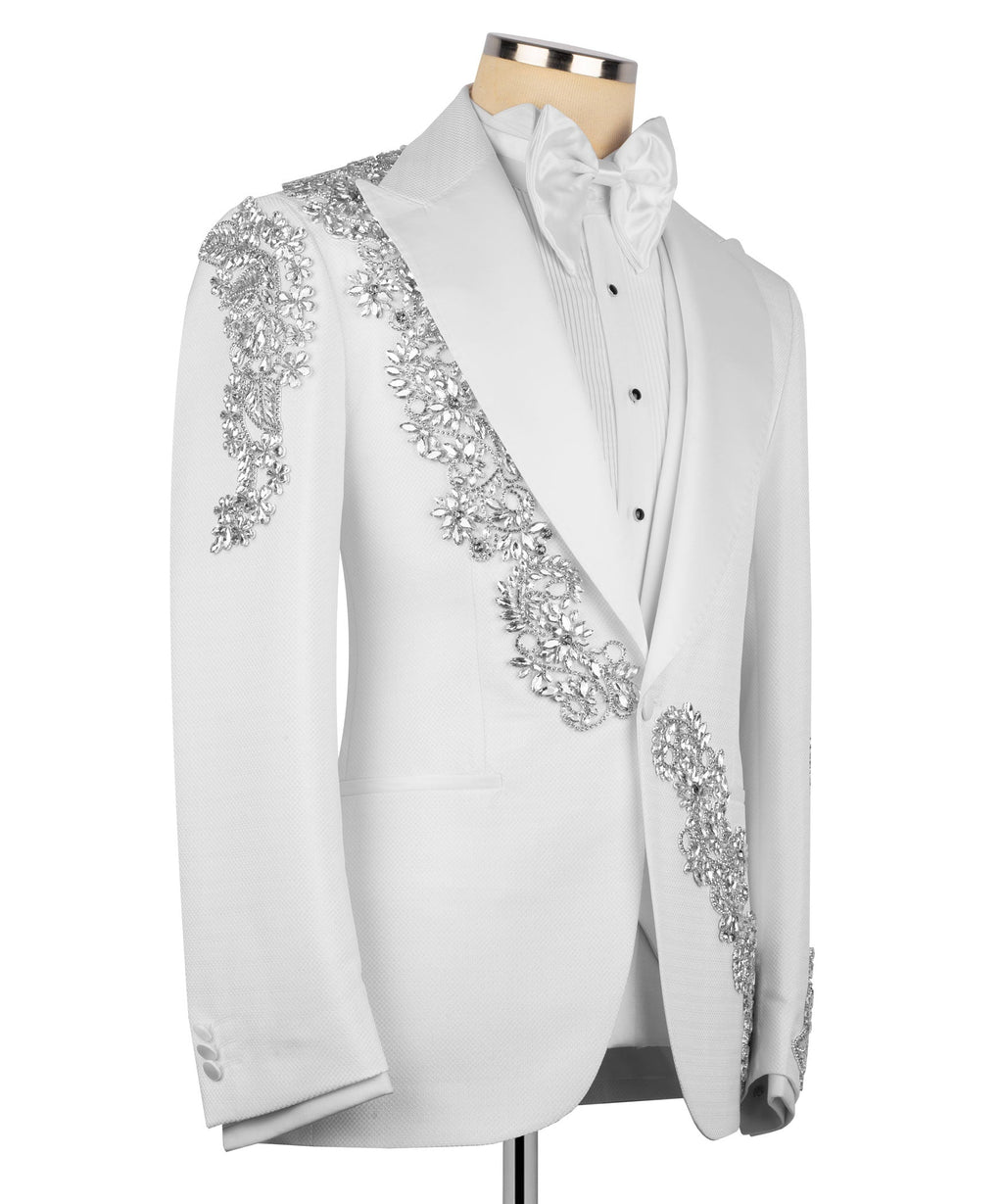 White tuxedo jacket with silver stone-embroidered lapel and pocket, bow tie