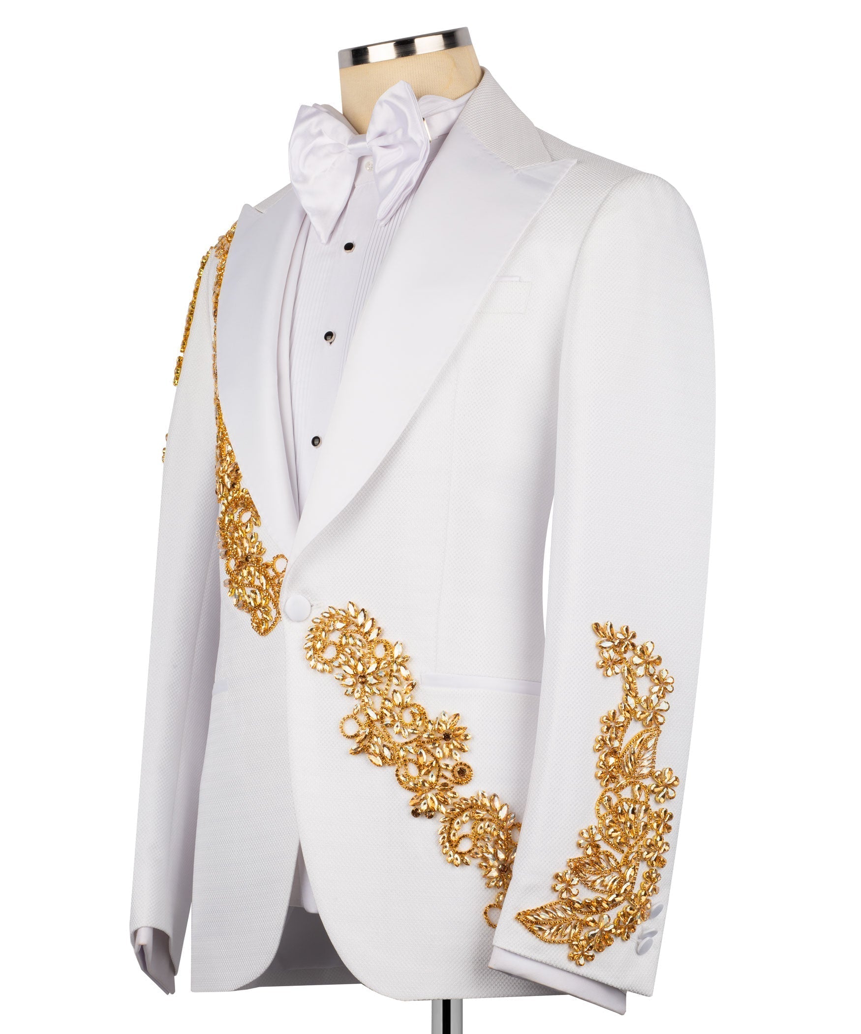 White tuxedo jacket angled view with gold stone-embroidered sleeves and bow tie