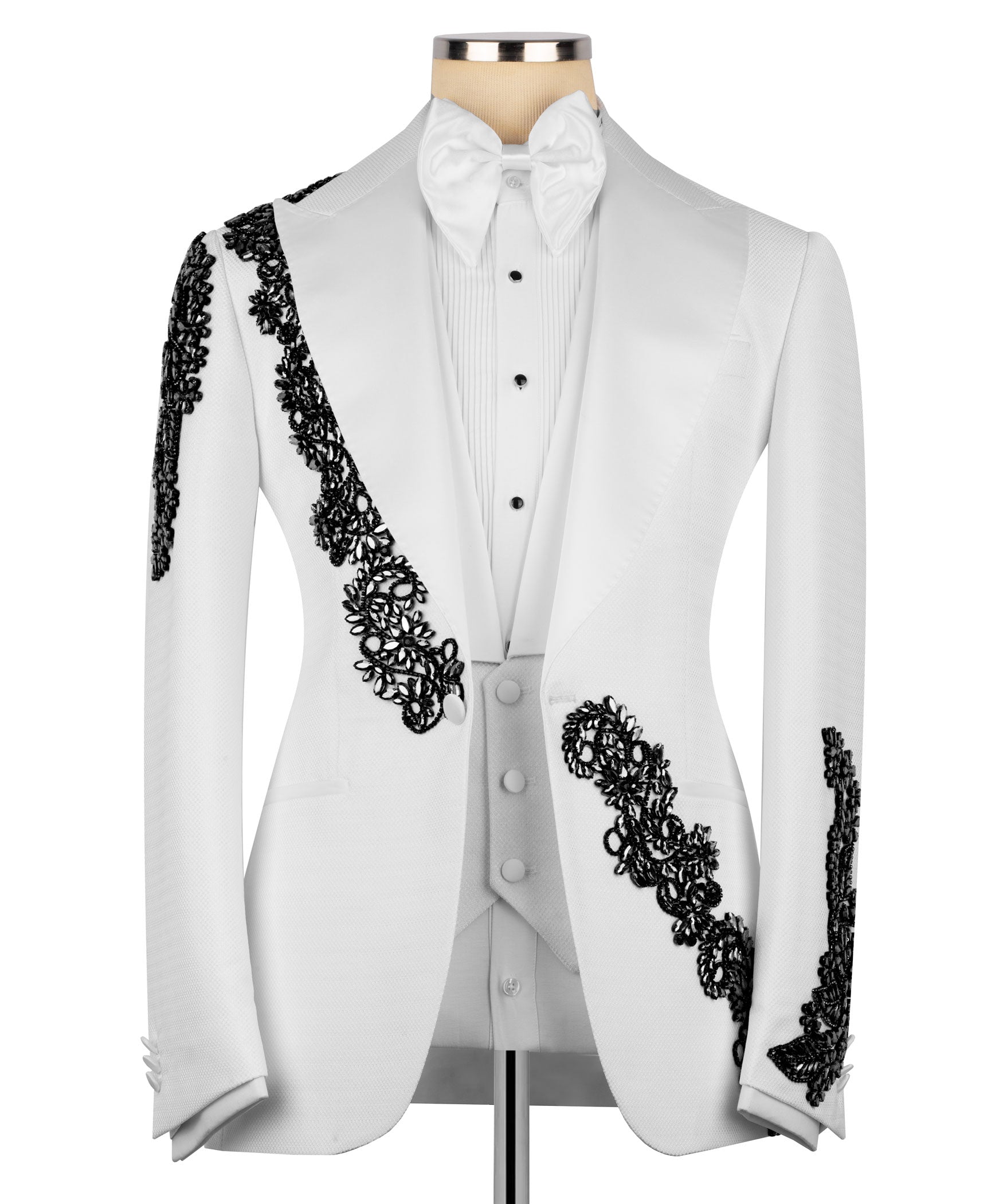 White tuxedo jacket with black stone-embroidered accents on lapel, waist, and sleeve