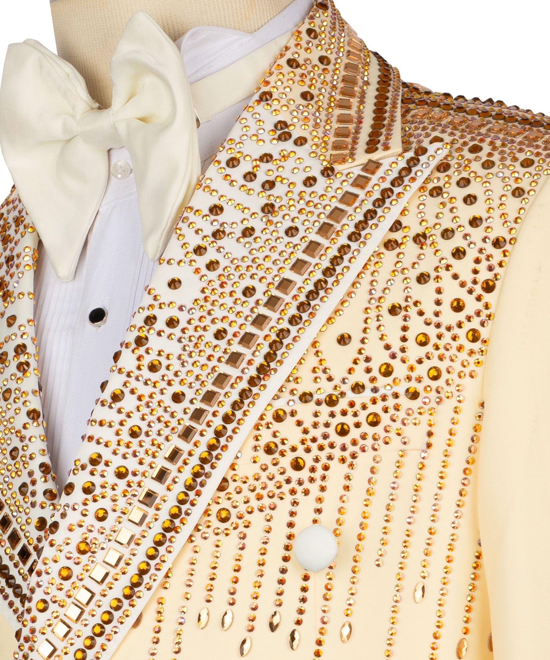 Close-up of yellow tuxedo lapel with gold stone embroidery and studded trim