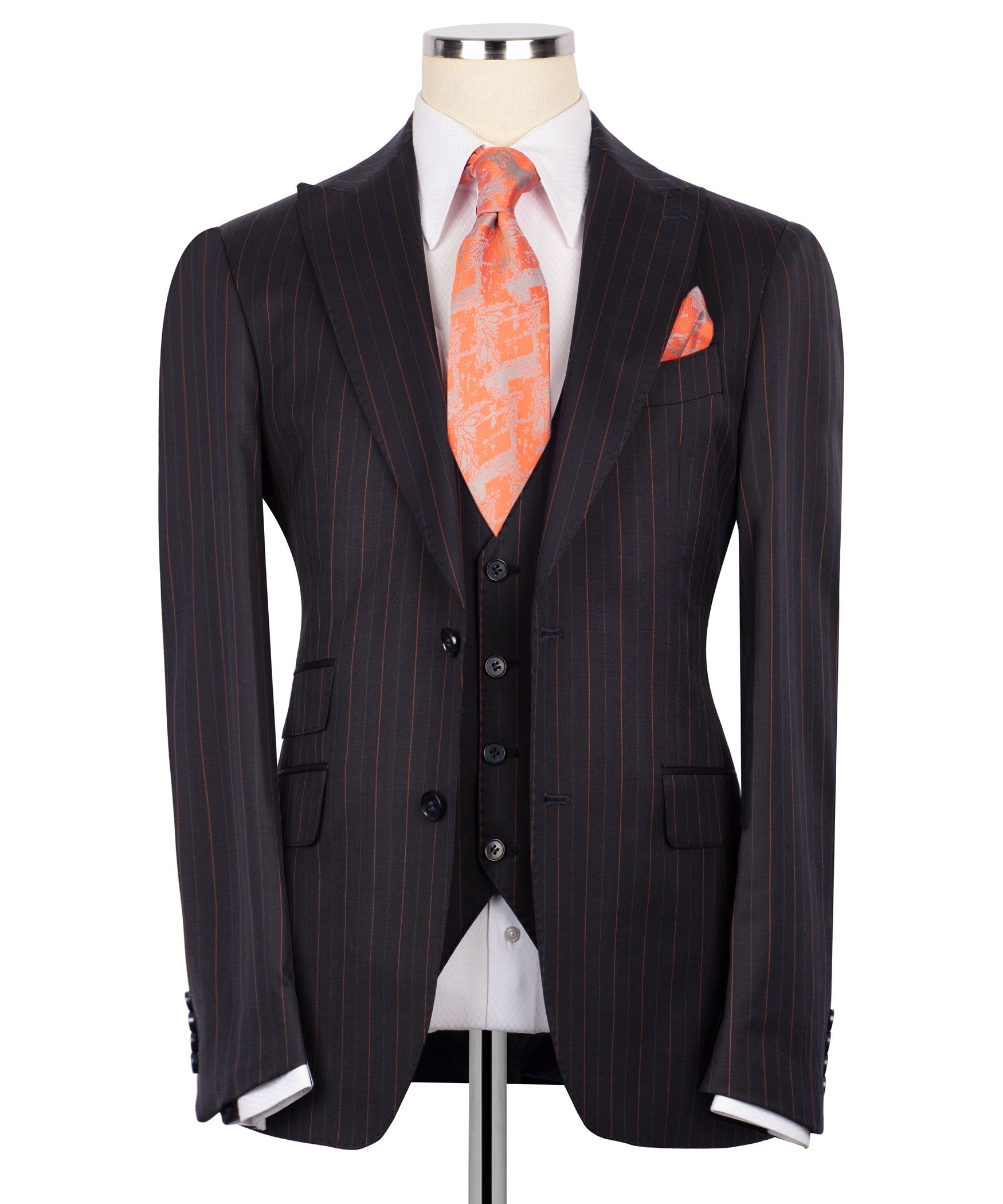 Dark pinstripe 3-piece suit jacket with buttoned vest and orange patterned necktie