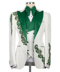 Green lapels and vest buttons on white tuxedo, with emerald stone embroidery details