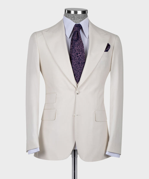 Cream blazer and vest front view on mannequin with purple patterned tie and pocket square