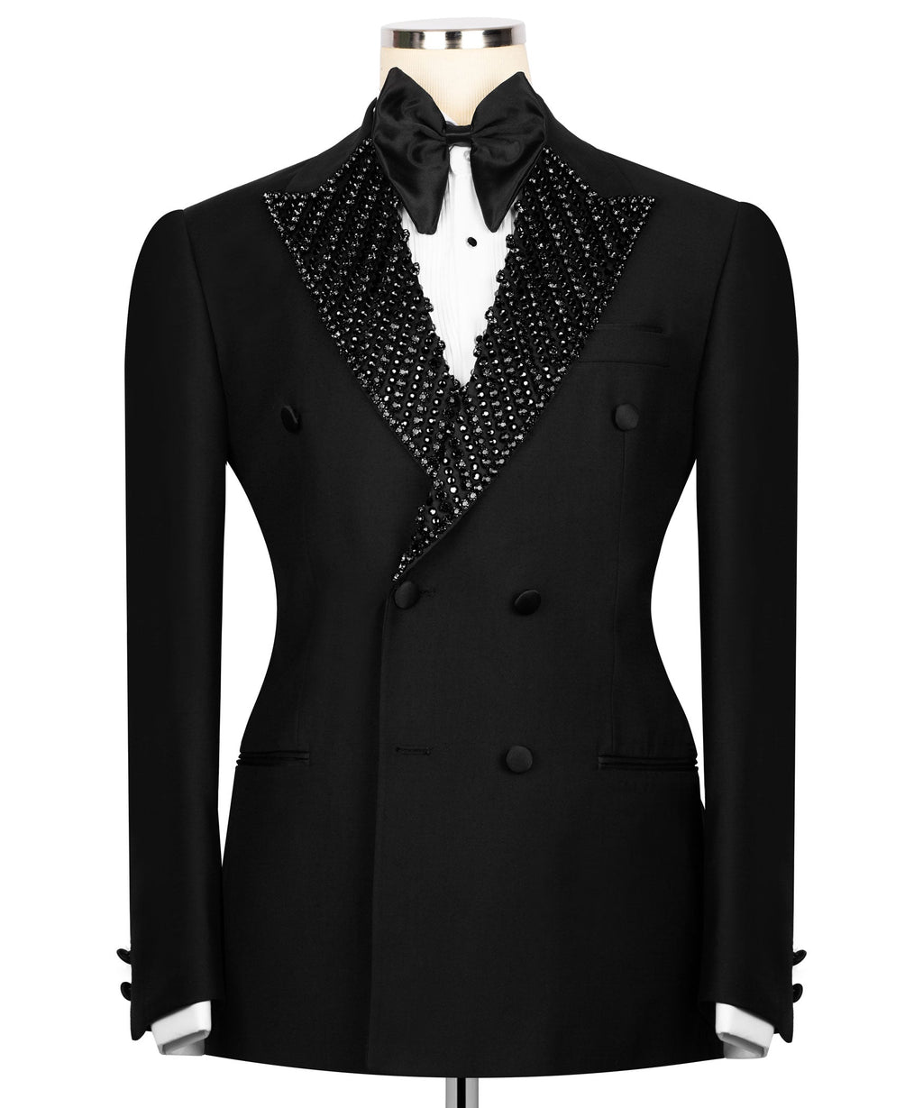 Black tuxedo jacket with jeweled embroidered peak lapels and satin bow tie