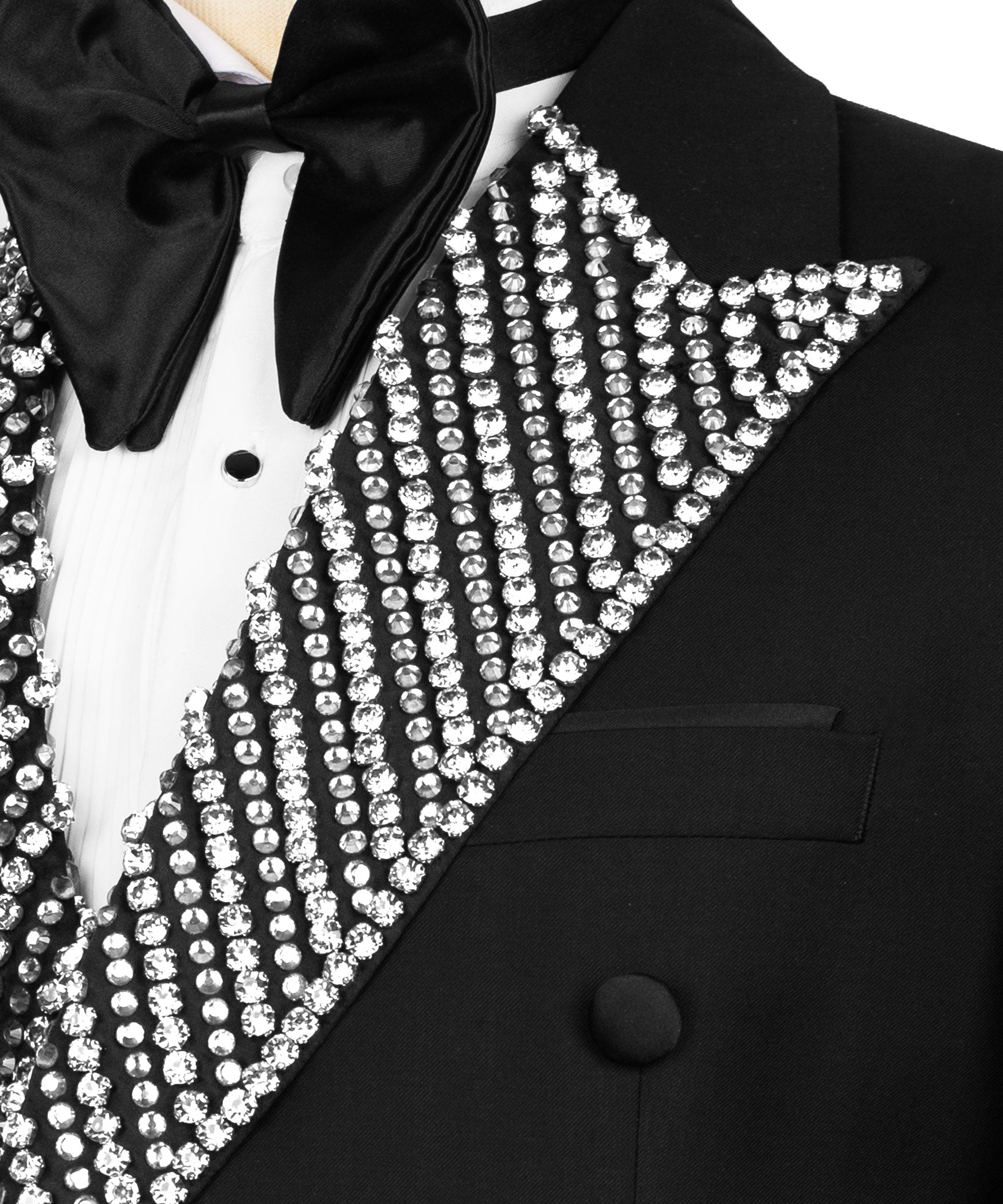 Close-up of black tuxedo lapel with vertical rhinestone embellishment and bow tie