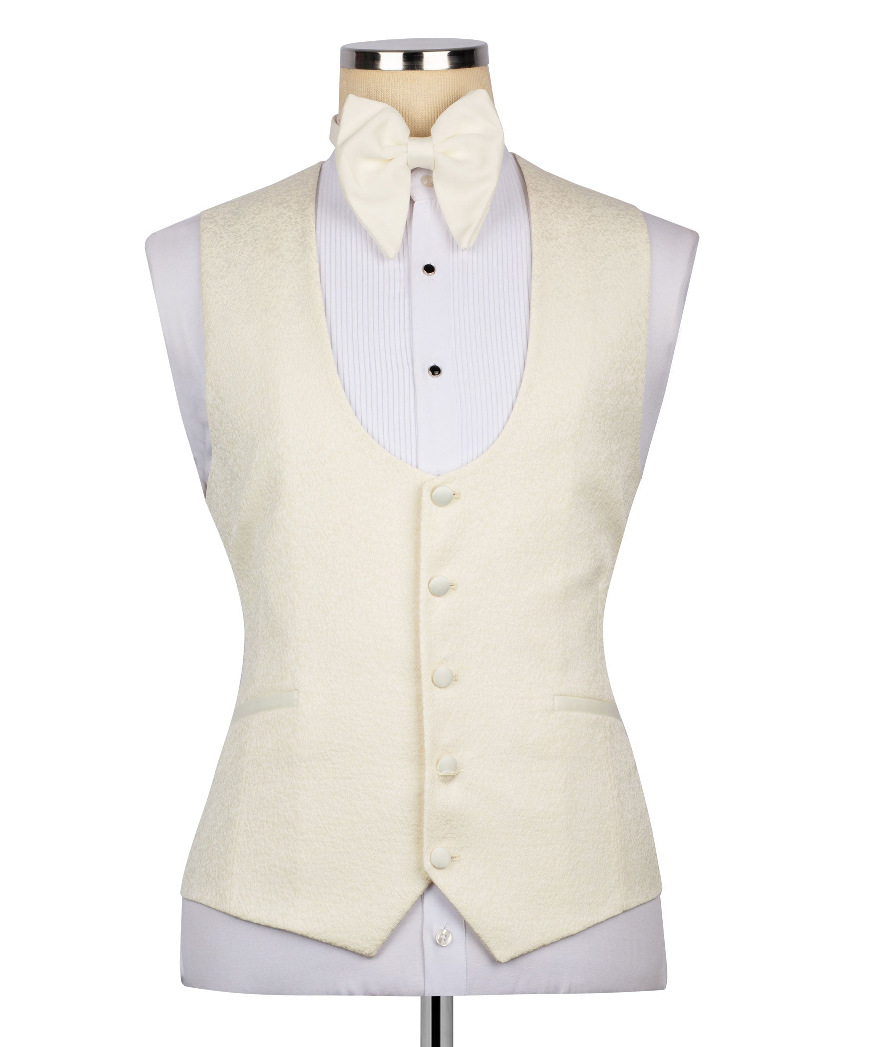 Cream tuxedo waistcoat vest with four-button front, paired with bow tie and jacket