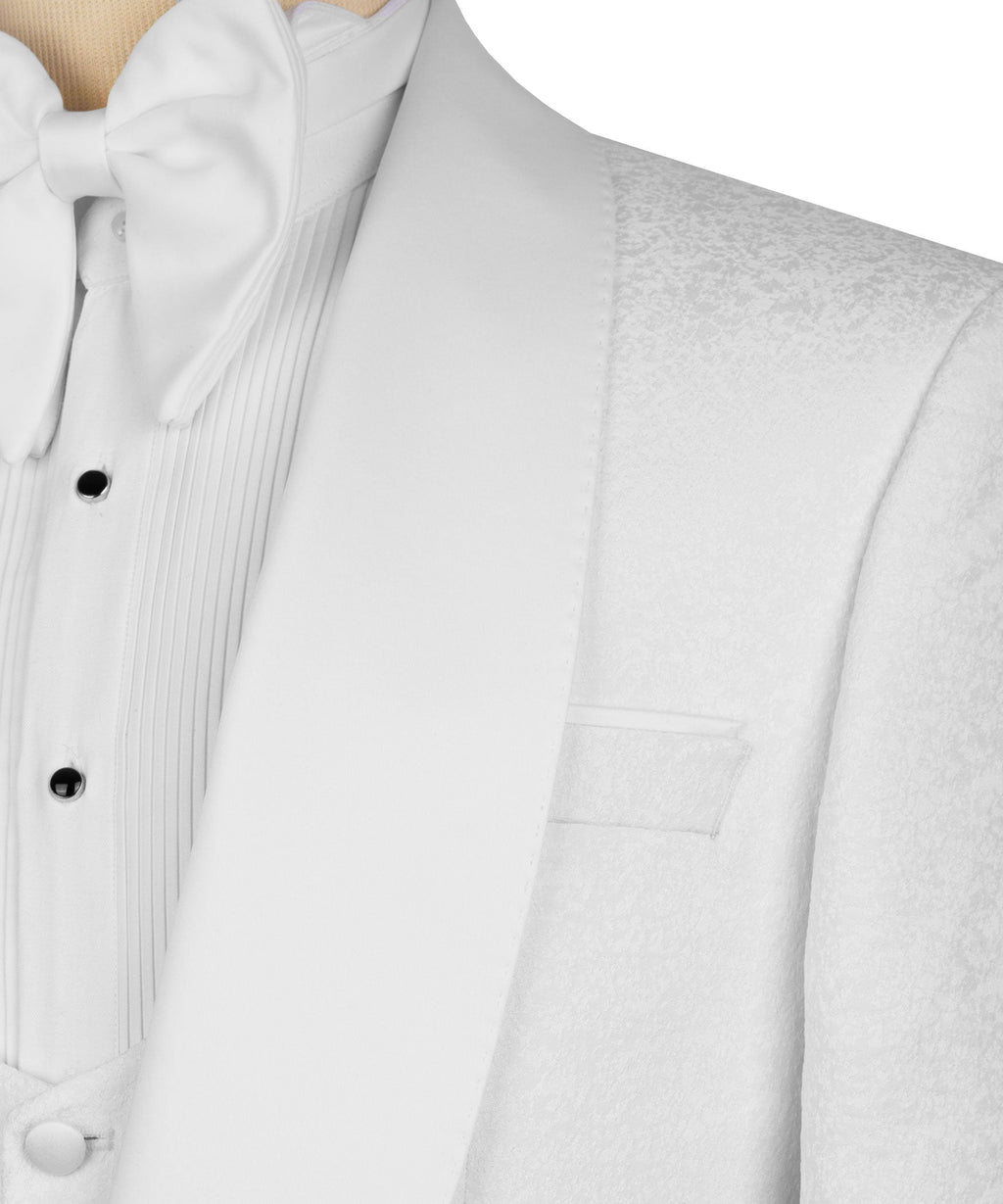 Close-up of white tuxedo jacket lapel, pocket flap, and vest button front