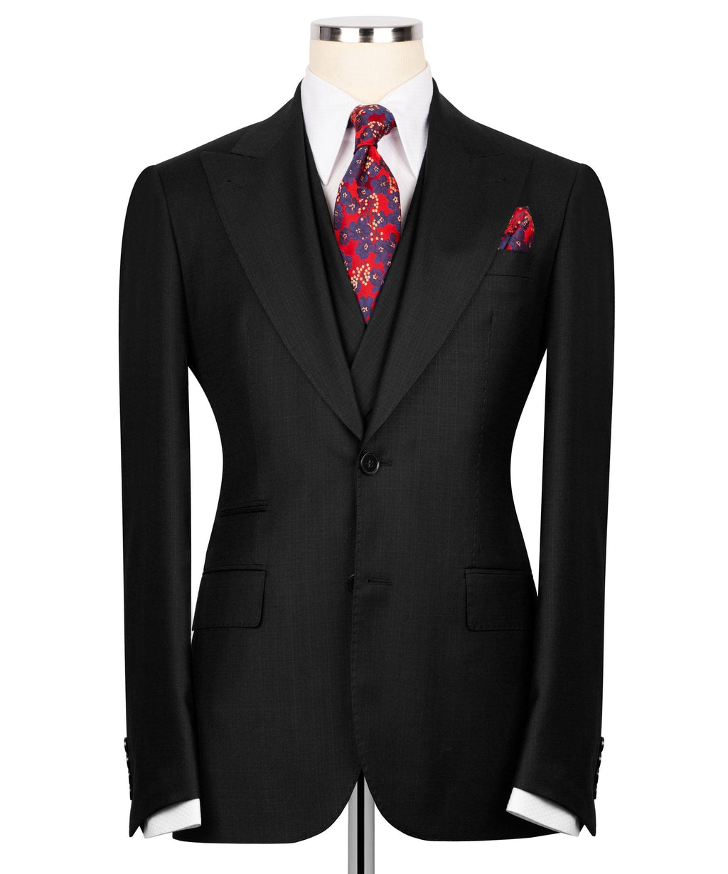 Front view: black suit jacket and vest with white shirt, red patterned tie, pocket square