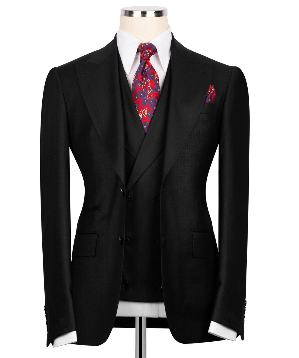 Black suit jacket and vest with white shirt, red floral tie, pocket square