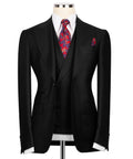 Black suit jacket and vest with white shirt, red floral tie, pocket square