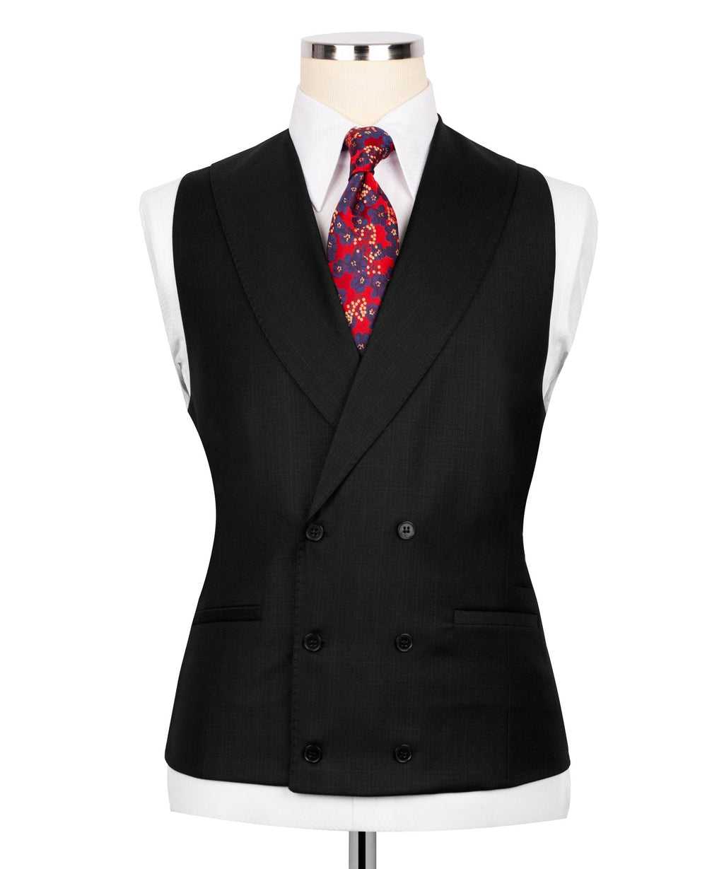 Black waistcoat vest with button front, white shirt and red patterned tie