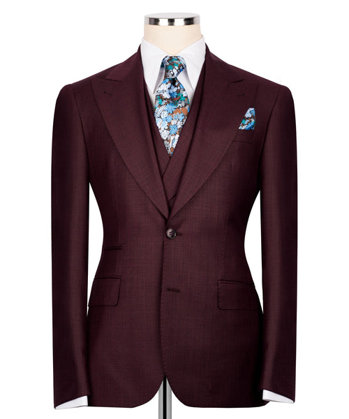 Burgundy three-piece suit jacket with floral tie and matching pocket square, front view