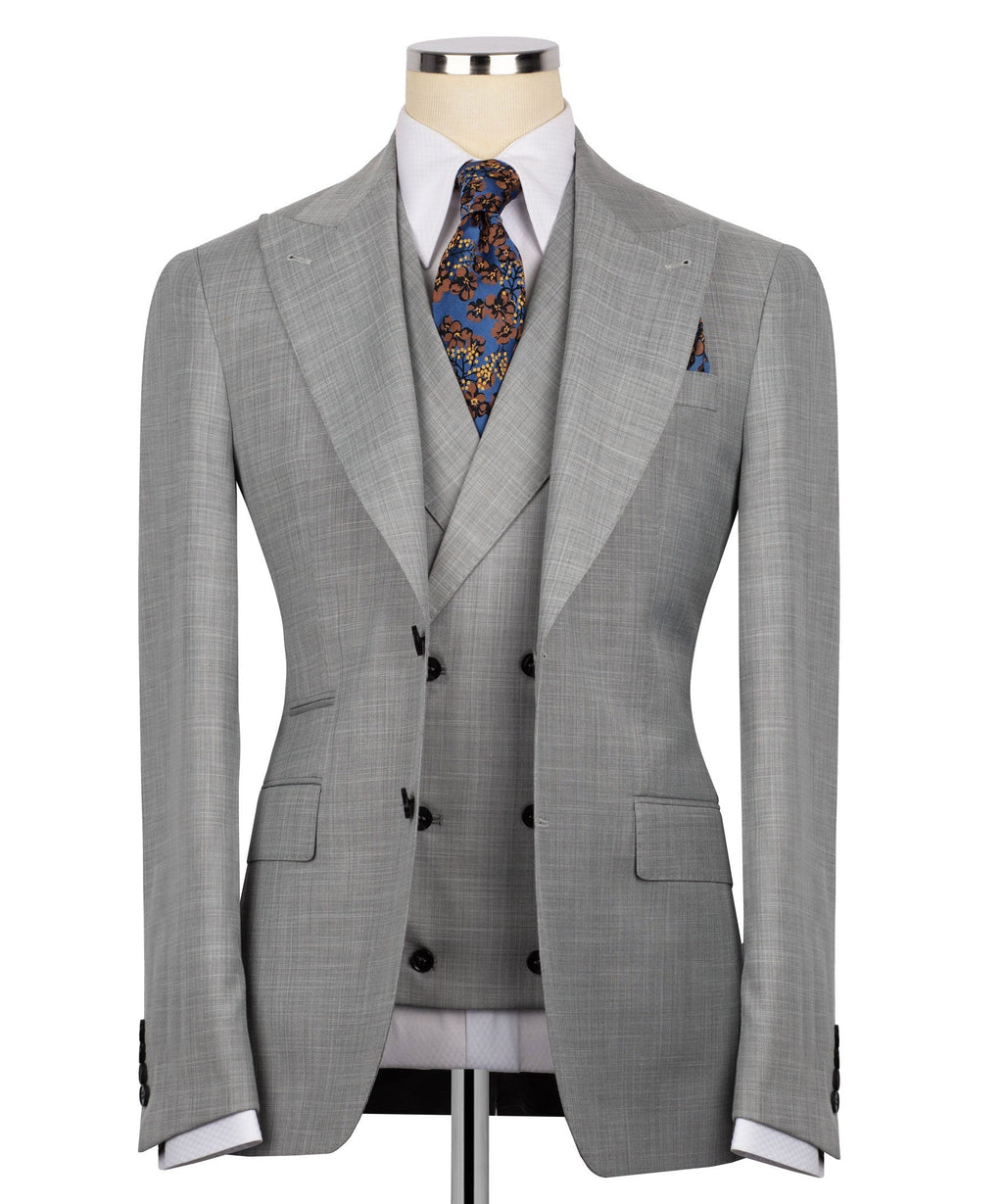 Grey check three-piece suit: suit jacket, waistcoat, patterned tie and pocket square